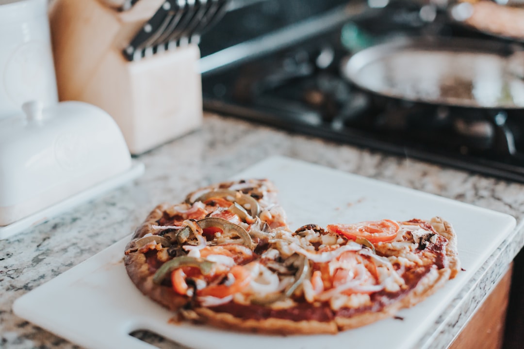 Blaze Pizza dough being hand-stretched